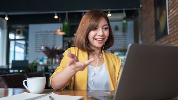 A young woman on web seminar.