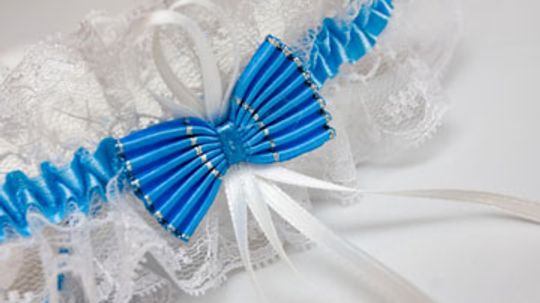 What is the history of the wedding garter tradition?