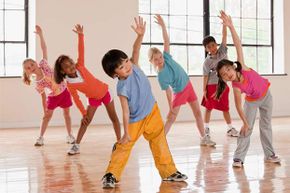 Regular P.E. helps kids learn sports and valuable life skills but the timeframe is not enough to help children lose weight.