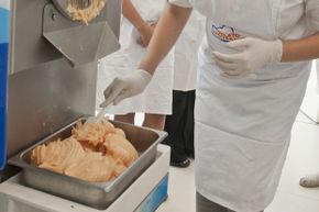 A student indulges in some yummy classwork at the Gelato University.