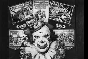 A publicity photograph for the Ringling Brothers & Barnum and Bailey circus shows a collage of posters surrounding a clown.