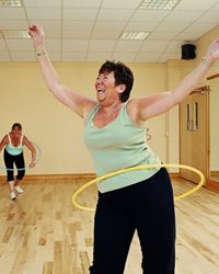 woman using hula hoop