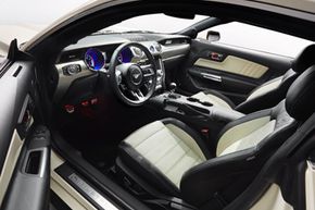 The 2015 Ford Mustang 50-Year Limited Edition interior in Wimbledon White and black leather with contrasting cashmere accents and stitching — and probably a bunch of VOCs, too.