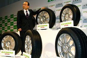 Bridgestone Corp. President Shoshi Arakawa unveils Ecopia EX10 tires, the latest products of its fuel-efficient Ecopia tire brand, in Tokyo, Japan.