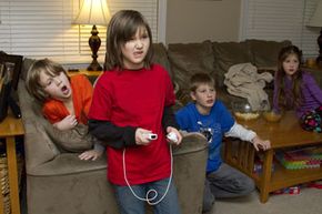 For those waiting for their turn, video games are sometimes a spectator sport. 