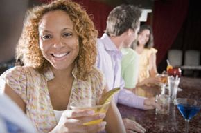 Woman having cockails at bar