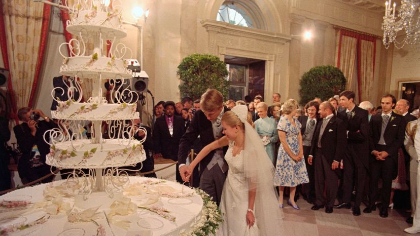 Edward Cox and Tricia Nixon cut wedding cake