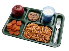 Who decides what goes into school lunches?