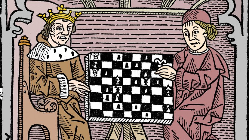 A king and a friar play a game of chess in 1474. 