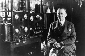 Italian inventor and radio pioneer Guglielmo Marconi in front of a telegraph in the laboratory aboard his yacht &quot;Electra&quot;, circa 1935.