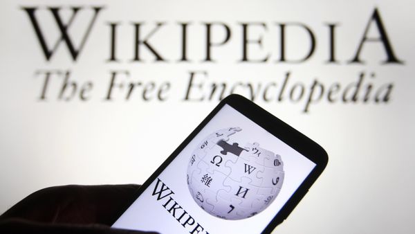 Wikipedia logo is seen on a smartphone
