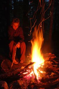 A campfire can provide warmth and light, as well as help bolster a lost hiker's spirits.