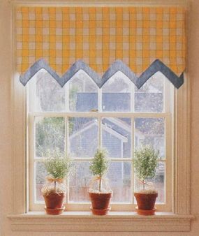 ©This End Up Furniture Co., Inc. Topped with only a pennant valance in sunny yellow and white checks with bluetrim, this kitchen window is left bare except for three herb topiaries gracing its sill.