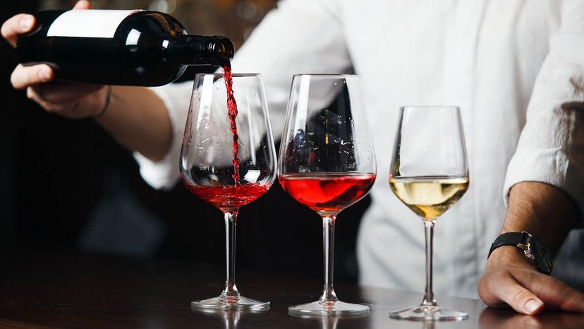 Sommelier pouring wines