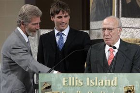 Robert Mondavi (right) with his son Tim (left) and grandson Carlo during an awards ceremony on Ellis Island, NYC in 2005. The awards are given annually to Ellis Island immigrants or their descendants who excel in their professions.