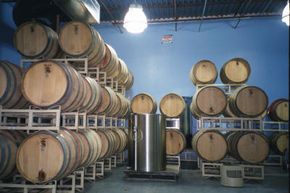 Wine is stored in oak barrels or stainless steel storage tanks.