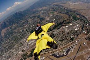Person performing extreme sports from aerial view outdoors.