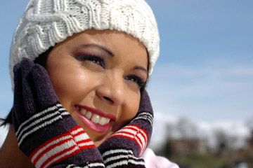 Woman in winter hat and gloves.