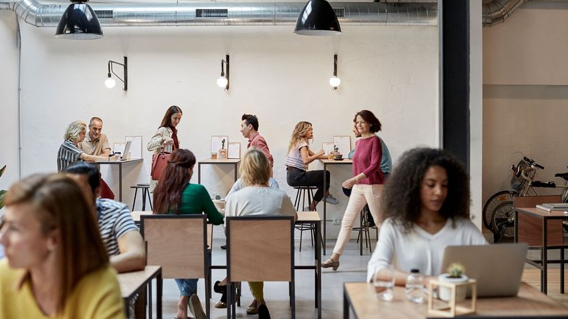 people working in a coffee shop