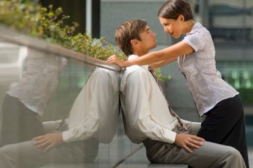 man, woman, park bench