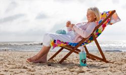 woman lounging on beach