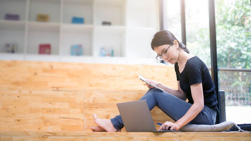 girl working at library