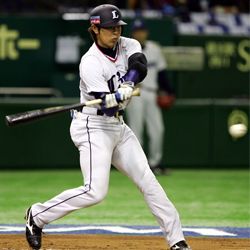 Haruki Kurose of Japan's Seibu Lions bats against China in a 2009 game.