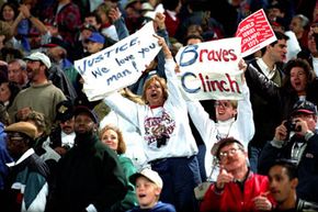 Fans cheer in the stands during Game 6 of the World Series between the Atlanta Braves and the Cleveland Indians in 1995.