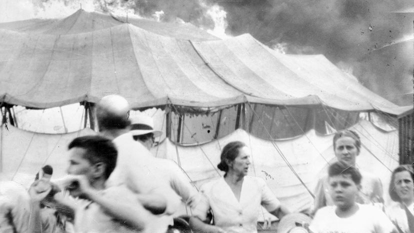 People run after a circus tent catches on fire