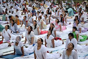 Yoga enthusiasts perform the cobra pose on International Yoga Day in Amritsar, India. Yoga started in India more than 5,000 years ago.