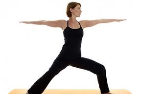 Warrior II, often done with Warrior I, stretches the chest and shoulders as well as the legs.