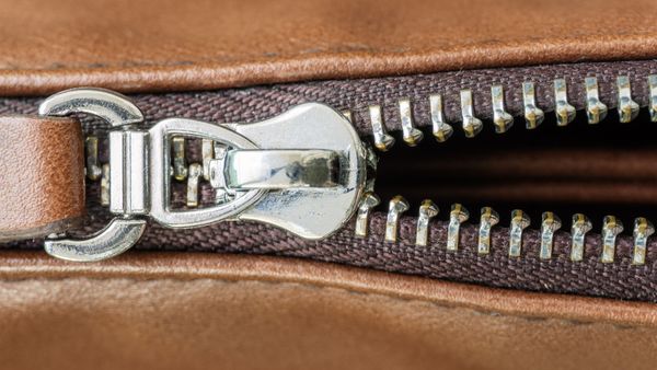 Silver Zipper on Brown Leather