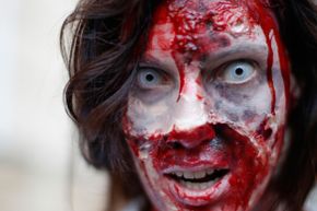 Woman dressed as zombie staring at camera