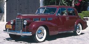 Considered a landmark automotive design, the 1938 Cadillac Sixty Special  sported chrome-edged windows and squareback fenders.