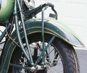 The rather awkward front suspension gained a rebound spring for 1935, and fenders were restyled with larger valances to smooth out the Chief's styling.