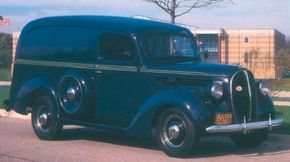 Ford's reskin of its 1938 trucks brought an oval-shaped grille and more car-like styling touches, as evidenced on this 1938 Ford Panel Delivery.See more classic truck pictures.