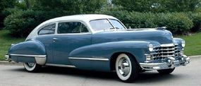 This 1947 Cadillac Series 62 coupe fastback has "sombrero" wheelcovers, a new design element for that model year.”border=