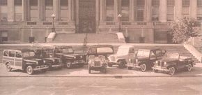 1948吉普车威利斯的稳定增长,包括第一个全钢的马车,一辆小货车,轿车,和好玩的Jeepster。看到更多的吉普车的照片。”width=