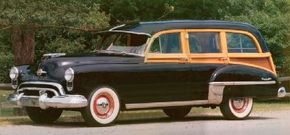 The final year for wood-bodied station wagons like this Oldsmobile 76 was 1949. See more classic car pictures.