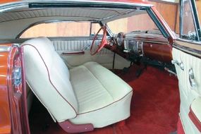 Bob Sipes stitched up a more traditional whitetuck-and-roll interior for current owner Jack Walker.