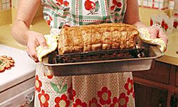 Though you may want to go for something more ambitious than a roast, little touches like a hostess apron in an intensely retro print will bring your guests back to the nifty '50s.