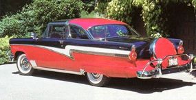 A red 1956 Ford Fairlane Crown Victoria.