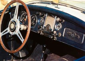 The MGA Twin Cam's dashboard featured a largespeedometer and tach.