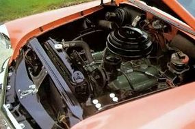 A look under the hood reveals the Buick Special Riviera coupe's engine.
