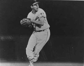 Brooks Robinson wins his first Gold Glove. See more baseball seasons pictures.