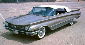 Though tamed down somewhat from flamboyant 1959, the 1960 Buick Electra nonetheless exhibited highly stylized lines. See more classic car pictures.