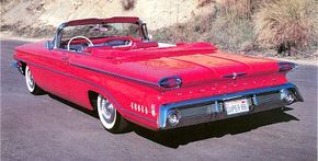 The 1960 Oldsmobile small Super 88 was vastly cleaner than the chrome-riddled 1958.