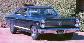 The 1967 Mercury Cyclone GT was marked by lower-body rally striping and a black-out grille.