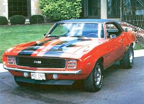 The Chevrolet Camaro was face-lifted for '69, gaining modified side sculpturing in addition to new grille and taillight treatments.