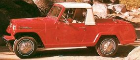 The 1967 Jeepster Pick-Up featured sporty full wheel covers and fake knock-off hubs.